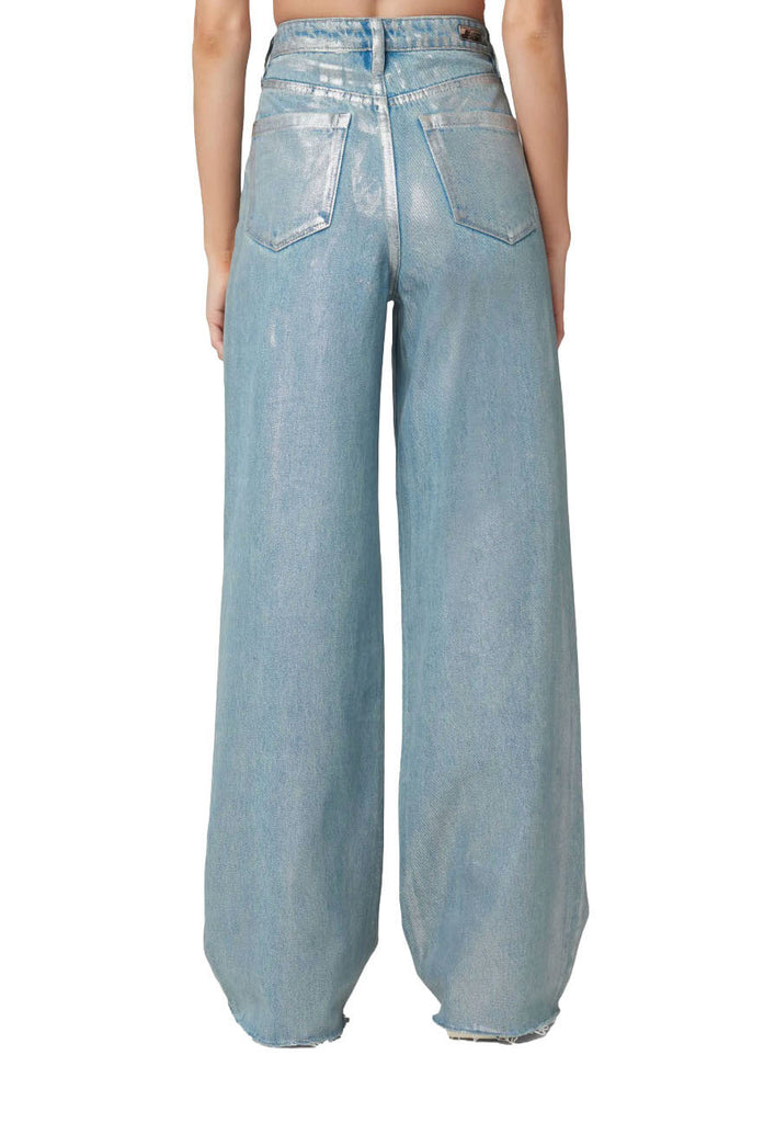 Blank NYC Metallic Jeans Silver Star. A metallic coating creates a sleek, chrome-like look on these high-waist jeans crafted from non-stretch organic-cotton denim in a wide-leg silhouette.