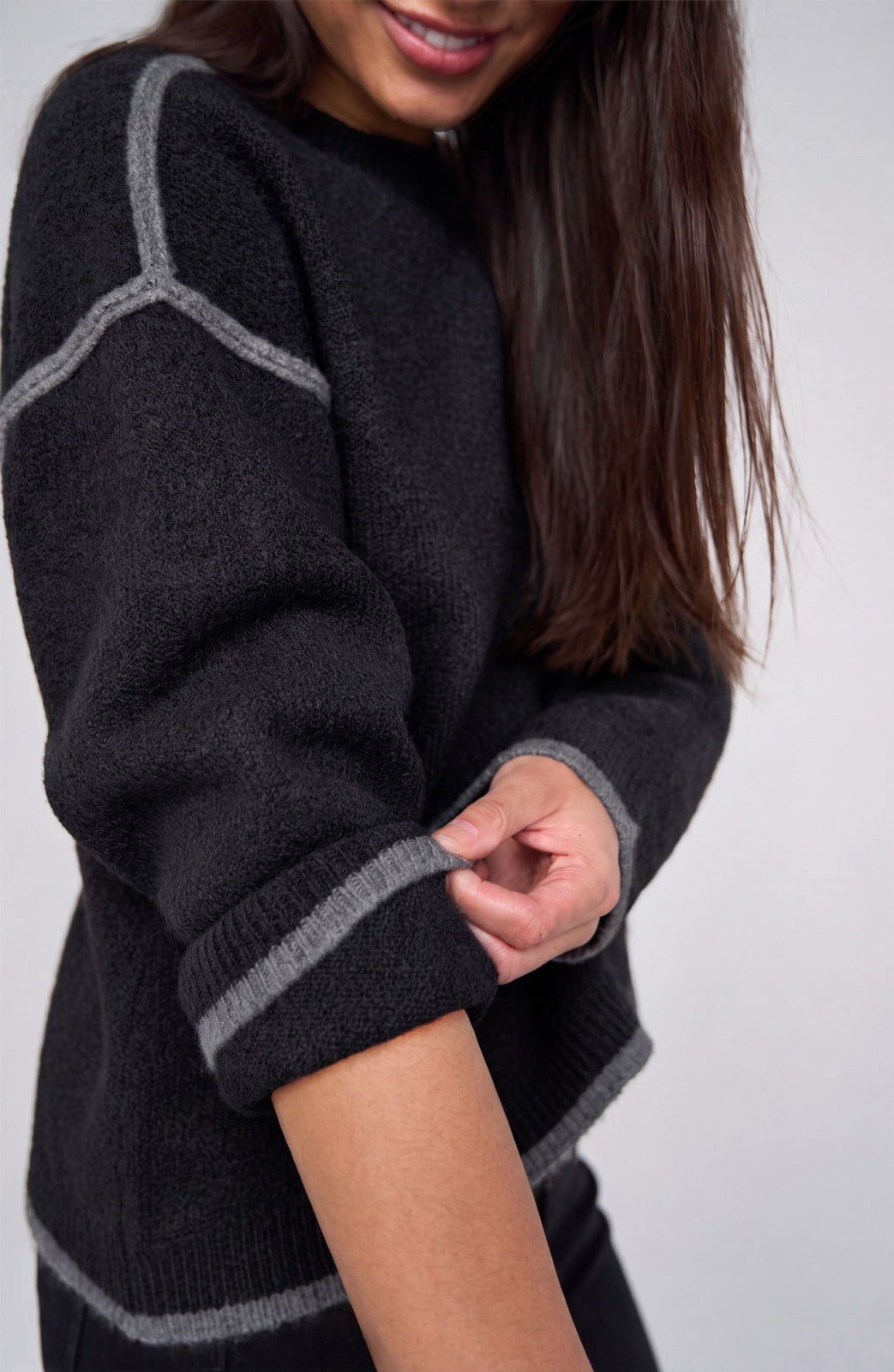 Liverpool Long Sleeve Tulip Hem Crewneck Sweater in Black With Light Heather Grey, front detail view