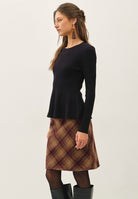 Be Cool Ribbed Knit Peplum Sweater in Black, side view
