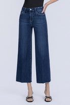Flying Monkey High Rise Crease Line Trouser Wide Leg Jean in Caring, detail of waistband and front pockets