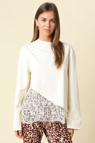 Olivaceous Charlie Asymmetrical Lace Trim Top in Cream, front