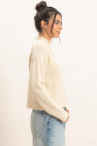 HYFVE Mock Neck Sweater in Cream, side view