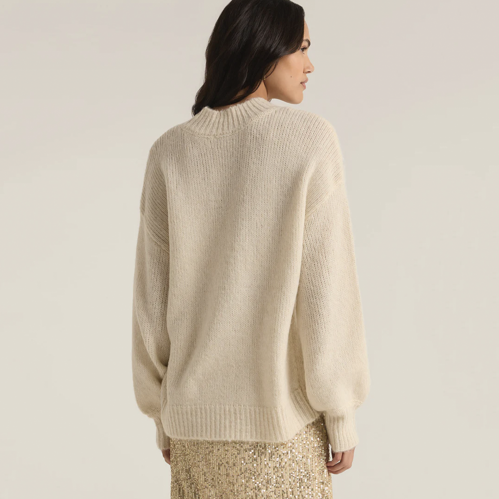 The Danica Sweater is the ultimate in cozy chic, featuring an oversized fit and a luxuriously soft, chunky Sweater Knit that feels like being wrapped in a blanket. With its relaxed silhouette and ultra-comfortable feel, this sweater is perfect for any season, effortlessly combining style and warmth for a truly comfy yet chic look.