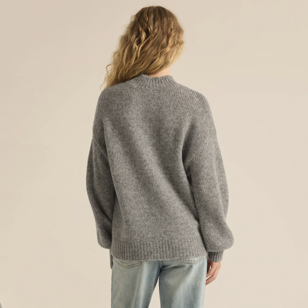 The Danica Sweater is the ultimate in cozy chic, featuring an oversized fit and a luxuriously soft, chunky Sweater Knit that feels like being wrapped in a blanket. With its relaxed silhouette and ultra-comfortable feel, this sweater is perfect for any season, effortlessly combining style and warmth for a truly comfy yet chic look.