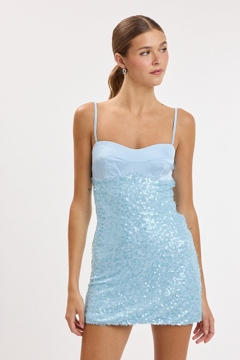 Fitted sequin mini dress with a sweetheart neckline, adjustable spaghetti straps, and an allover shimmer finish.