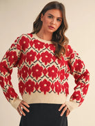 floral knit sweater women, red patterned sweater, statement sweater women, cozy winter knit, bold print sweater, women’s crewneck sweater, textured knit sweater, chic fall sweater