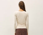 Be Cool Boat Neck Long Sleeve Side Ruched Knit Top in Ecru, back view