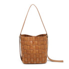 Brown woven handbag with a strap on a white background