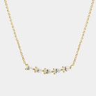 Subtle sparkle, elevated simplicity. This delicate gold chain necklace features a row of marquise-cut stones set in a soft curve for an effortlessly chic look. Feminine and refined, it adds just the right amount of shine whether worn alone or layered with your everyday favorites. A timeless piece that feels special but easy.