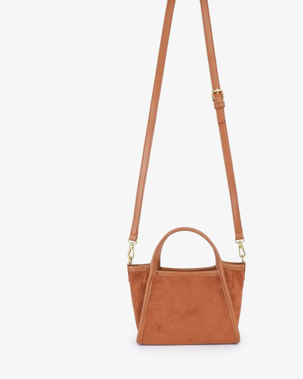 Remi & Reid Gillie Mini Satchel in Camel, with crossbody strap attached, front view