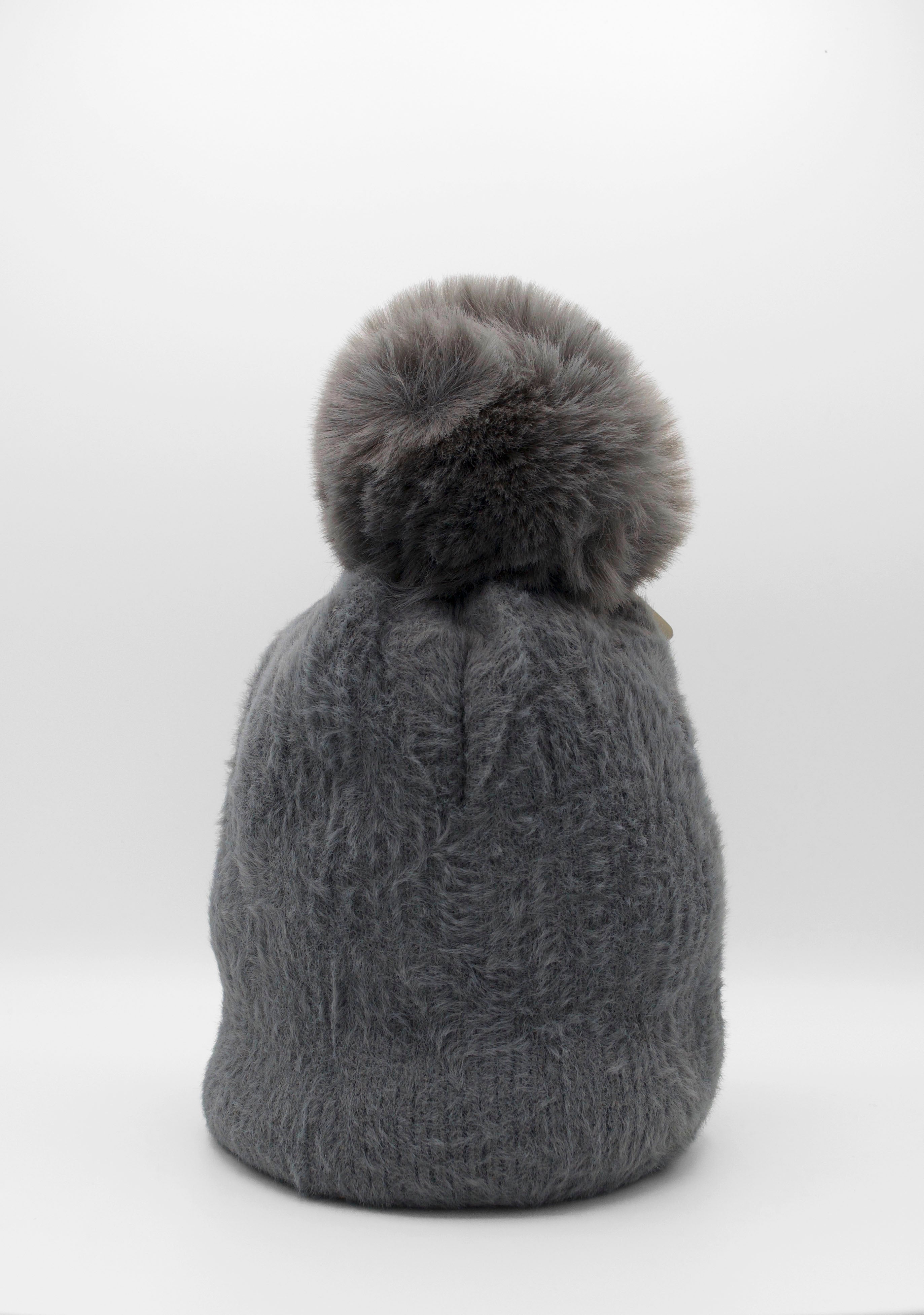 Classic Fuzzy Pom Beanie Grey. This fuzzy beanie features a soft fuzzy fabric with a pom-pom on top, perfect for wearing everyday in the colder months.