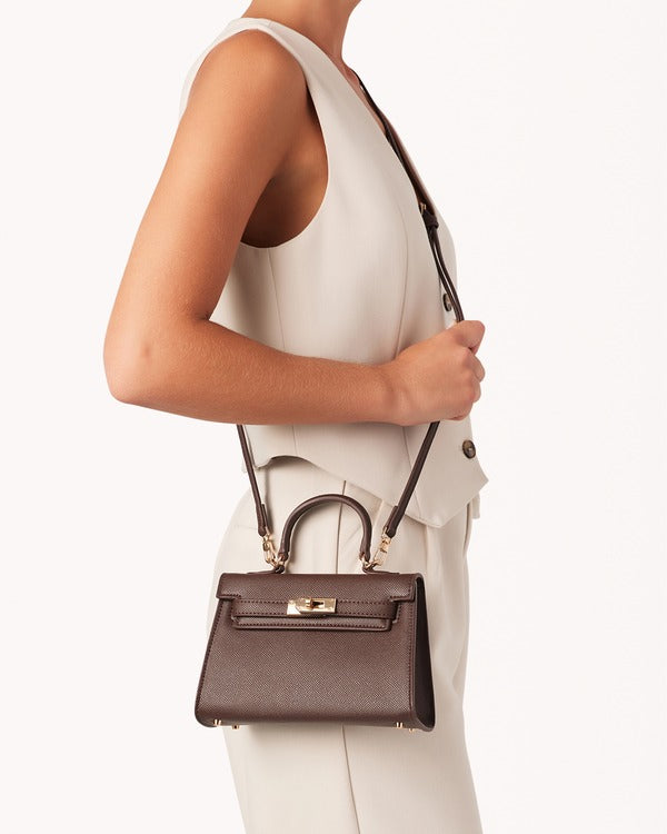 Billini Hariette Mini Handle Bag in Chocolate Saffiano, worn crossbody on model