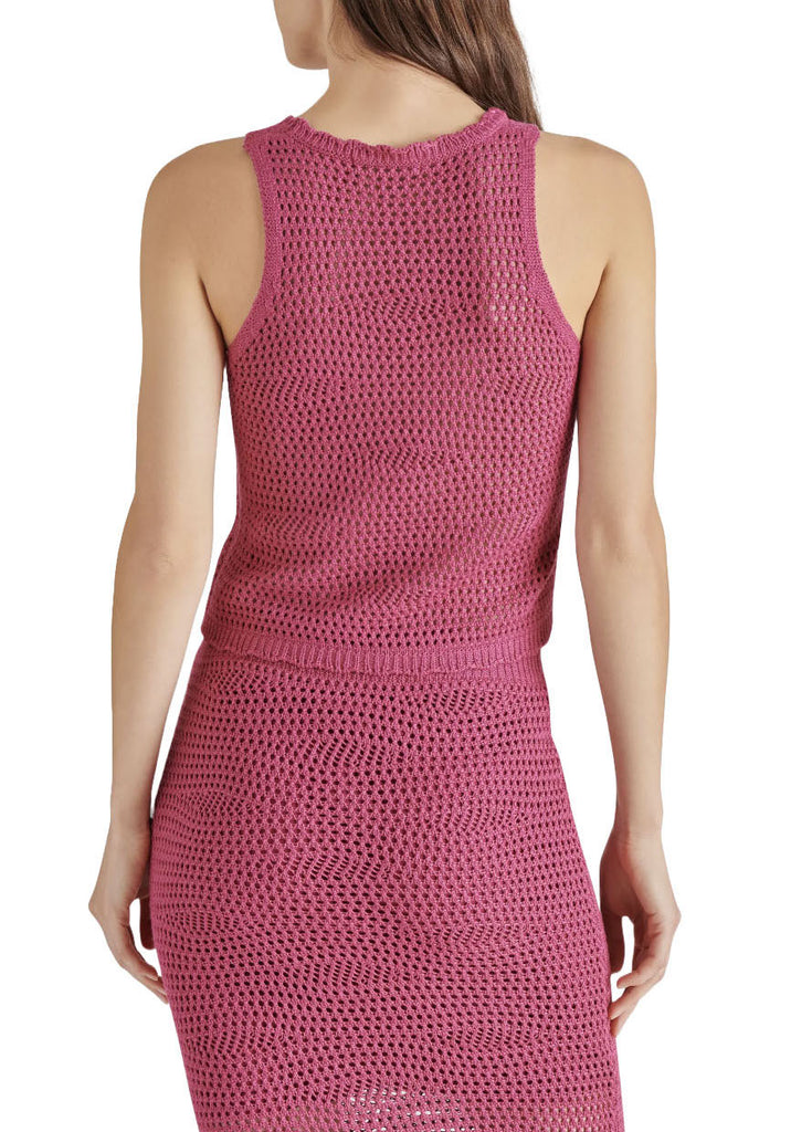 Steve Madden Hannah Sweater Misty Rose. Introducing the Hannah Sweater a spring-themed crochet sweater tank. The sleeveless sweater adds a touch of elegance to your wardrobe. Made with scalloped trim and crafted with precision, this crochet sweater is a must-have.