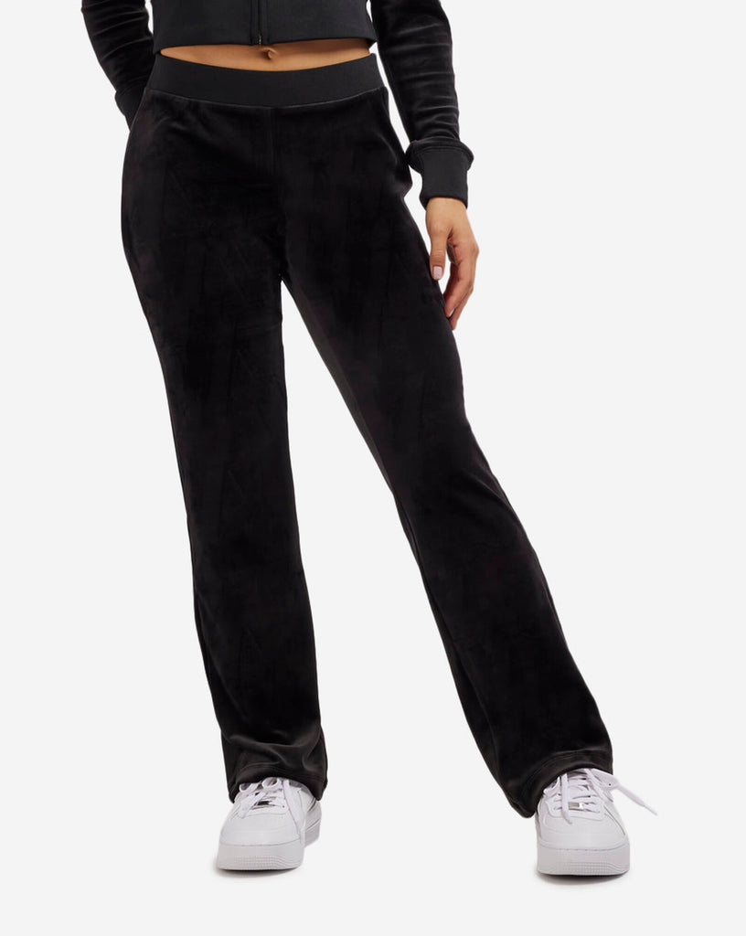 Juice Couture Velour Pant Licorice. For a luxury look that commands attention, these bling velour pants provide exactly what you need to stand out in style. The ribbed elastic waistband and soft stretch fabric create a cozy fit and feel for all day wear.