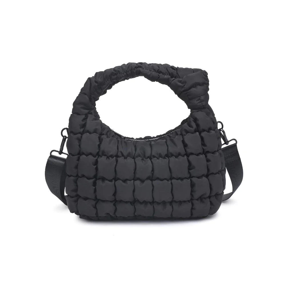 Sol & Selene Radiance Bag Black. The Radiance bag exudes a subtle elegance with its puffy quilted nylon construction, designed for the fashion-forward and wellness-minded individual. Its chic design harmonizes with a practical form, offering an uplifting accessory for everyday grace and functional flair.