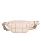 Sol & Selene Resurgence Belt Bag Cream. Embrace the bounce-back spirit with our Resurgence belt bag, featuring a quilted puff design for an on-trend, chic look, perfect for hands-free convenience while revitalizing your outfit with its unique charm and functional flair. Keep all your essentials handy and organized.