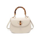 Allison Bamboo Crossbody Ivory. Crafted from smooth vegan leather, this bag features a sophisticated faux bamboo top handle and gold hardware for that touch of luxury. With an adjustable/detachable strap and a thoughtfully lined interior, it's not just a bag; it's a statement piece that keeps you organized on the go.