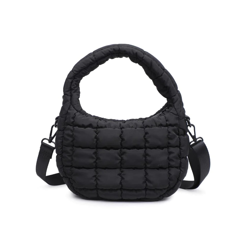 Leo Crossbody Black. Made from sturdy nylon, this bag features a trendy puffy quilted design that adds an unexpected, eye-catching texture. Inside, the fabric-lined interior is home to a zip pocket that securely stashes your daily must-haves.