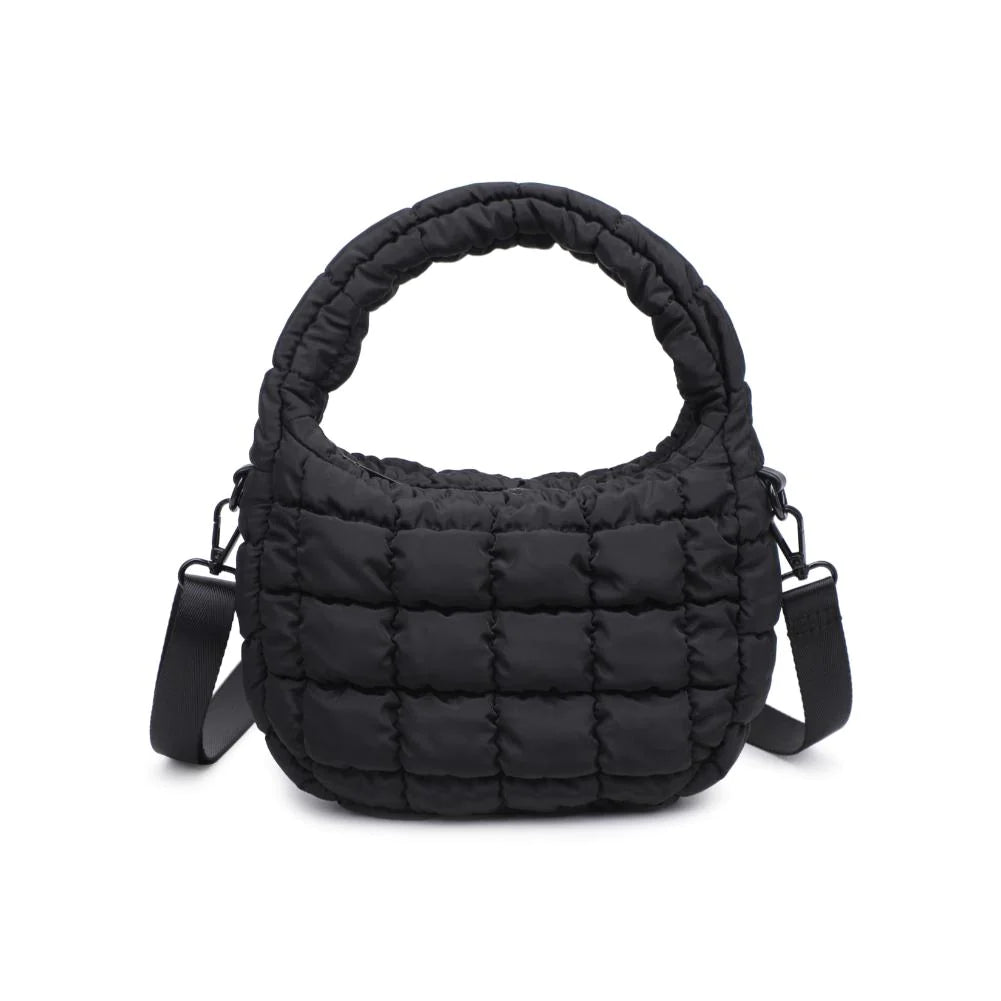 Leo Crossbody Black. Made from sturdy nylon, this bag features a trendy puffy quilted design that adds an unexpected, eye-catching texture. Inside, the fabric-lined interior is home to a zip pocket that securely stashes your daily must-haves.