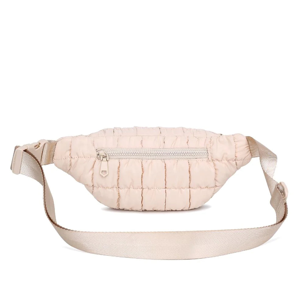 Sol & Selene Resurgence Belt Bag Cream. Embrace the bounce-back spirit with our Resurgence belt bag, featuring a quilted puff design for an on-trend, chic look, perfect for hands-free convenience while revitalizing your outfit with its unique charm and functional flair. Keep all your essentials handy and organized.