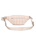 Sol & Selene Resurgence Belt Bag Cream. Embrace the bounce-back spirit with our Resurgence belt bag, featuring a quilted puff design for an on-trend, chic look, perfect for hands-free convenience while revitalizing your outfit with its unique charm and functional flair. Keep all your essentials handy and organized.