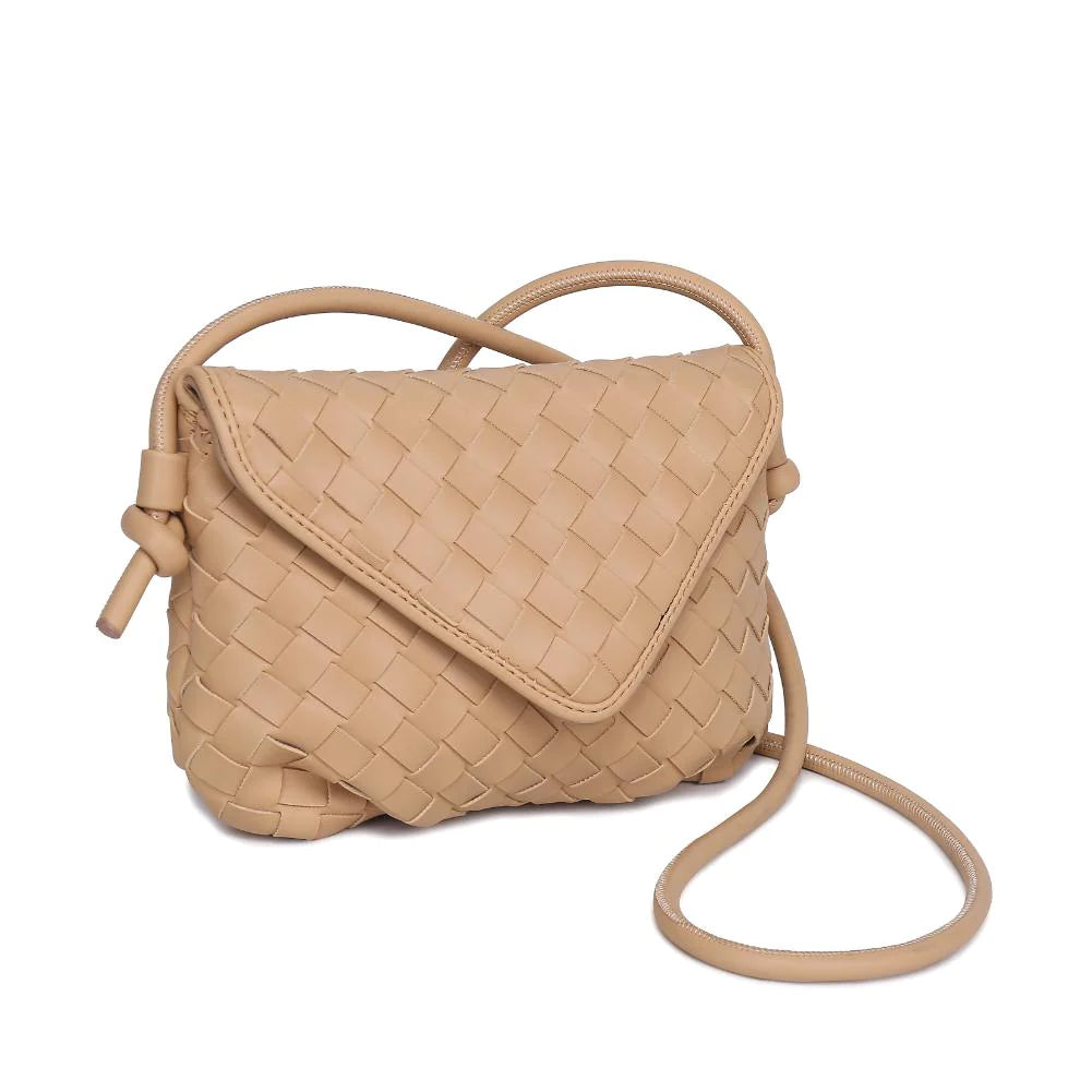 Kylo Crossbody Oat Milk. Elevate your look with the charm of this woven vegan leather crossbody. The knotted strap and gold hardware beautifully complement the envelope shape, creating an accessory that's both stylish and functional with its fabric-lined interior, including one zip pocket and one slip pocket.