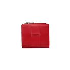 Amelie Wallet Red. The woven design and gold hardware make a fashion statement, while the snap button closure ensures your belongings stay secure. Inside, find a thoughtfully organized space with a main compartment, coin zip pocket, and eight card slots for maximum functionality.