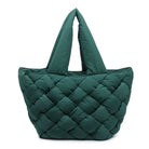 Sol & Selene Intuition East West Tote Emerald. An intuitive person trusts their inner voice and follows their intuition and heart. We've made that easy to do with this take everywhere, carry all tote, featuring a zipper closure and quilted detail that draws eyes and attention.