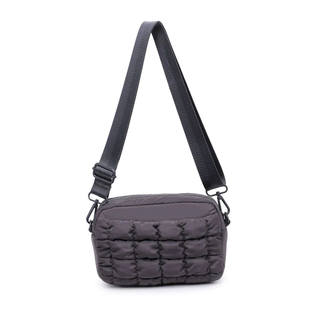 Sol and Selene Inspiration Quilted Crossbody Charcoal. Whether you're brainstorming business plans or catching flights across the country, the Inspiration integrates fashion and function, while providing space to store your must-haves. Featuring a quilted design, this crossbody bag keeps you going while the ideas are flowing!