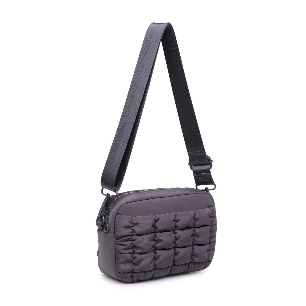 Sol and Selene Inspiration Quilted Crossbody Charcoal. Whether you're brainstorming business plans or catching flights across the country, the Inspiration integrates fashion and function, while providing space to store your must-haves. Featuring a quilted design, this crossbody bag keeps you going while the ideas are flowing!