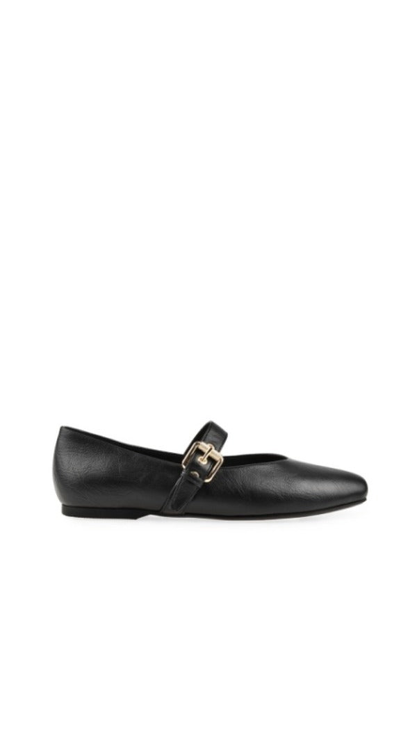 Black leather Mary Jane flat with buckle strap, side profile view.