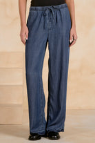 Close-up of the drawstring waist on the Elan Drawstring Pants in Navy Wash.