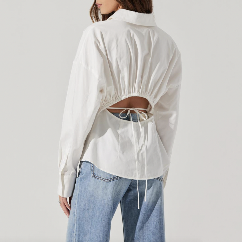 Elevate your wardrobe with this ASTR Olwen Top, a chic fusion of classic sophistication and contemporary flair. This versatile blouse is perfect for any occasion, whether you're dressing up for a night out or styling it for a casual day look.