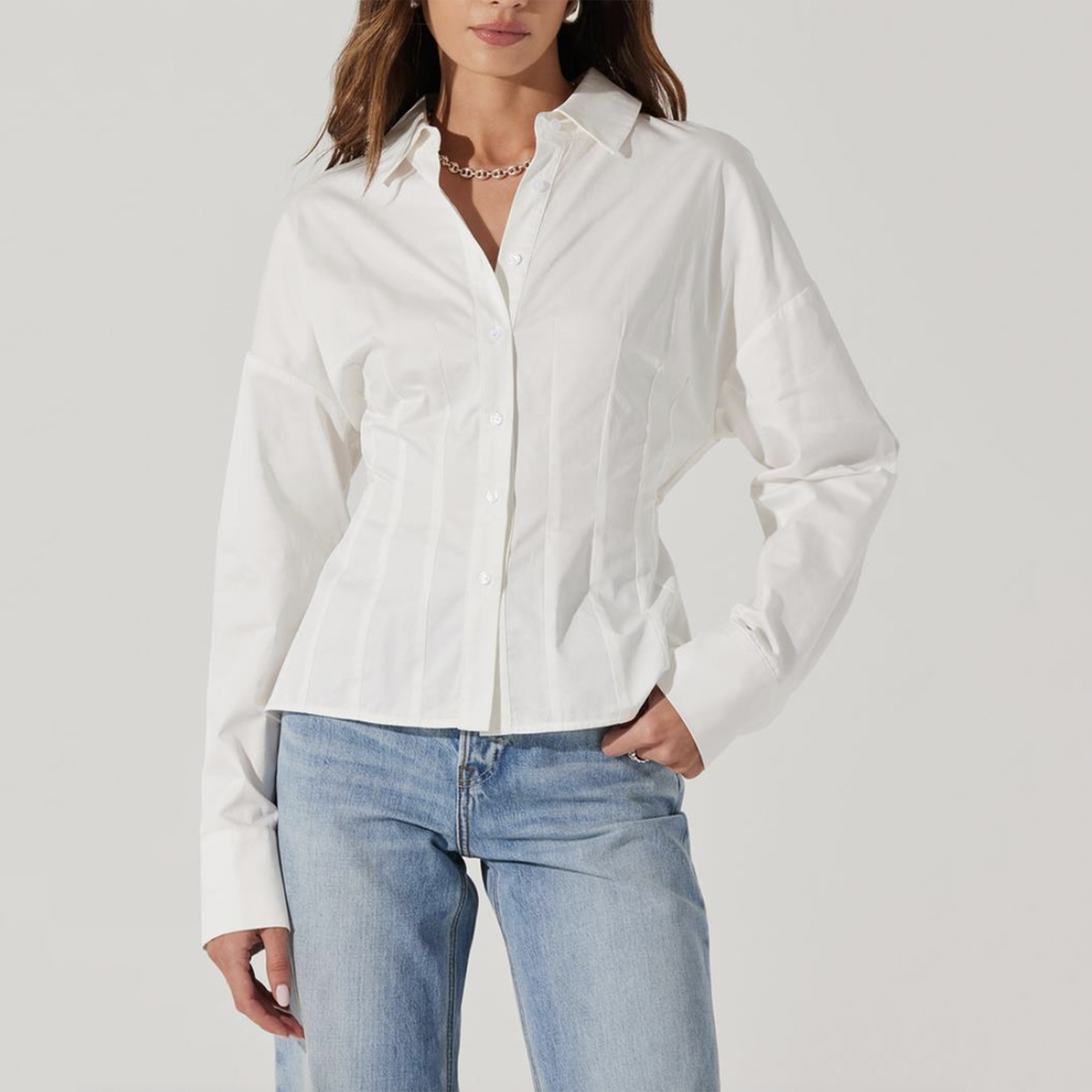 Elevate your wardrobe with this ASTR Olwen Top, a chic fusion of classic sophistication and contemporary flair. This versatile blouse is perfect for any occasion, whether you're dressing up for a night out or styling it for a casual day look.