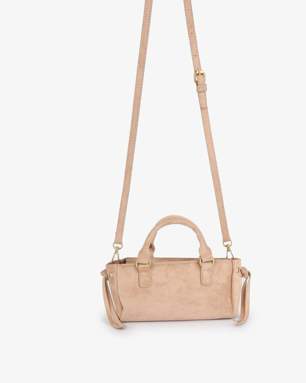 Remi & Reid Pepper Mini Satchel Faux Suede in Tan, with crossbody strap attached, front view