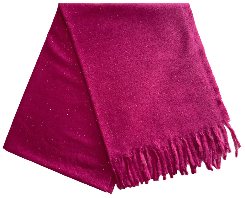 Sparkle Scarf Pink. This soft scarf features subtle sparkle throughout and fringe ends, perfect for adding a little extra glam to any outfit day or night.