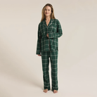 Snuggle up in this striped pajama set, crafted from soft-washed flannel for ultimate comfort. The top features a v-neck, collared button-front design with classic buttons, while the mid-rise, full-length pants offer an elastic waistband and side seam pockets. It’s the perfect cozy set to make your new go-to for relaxation.