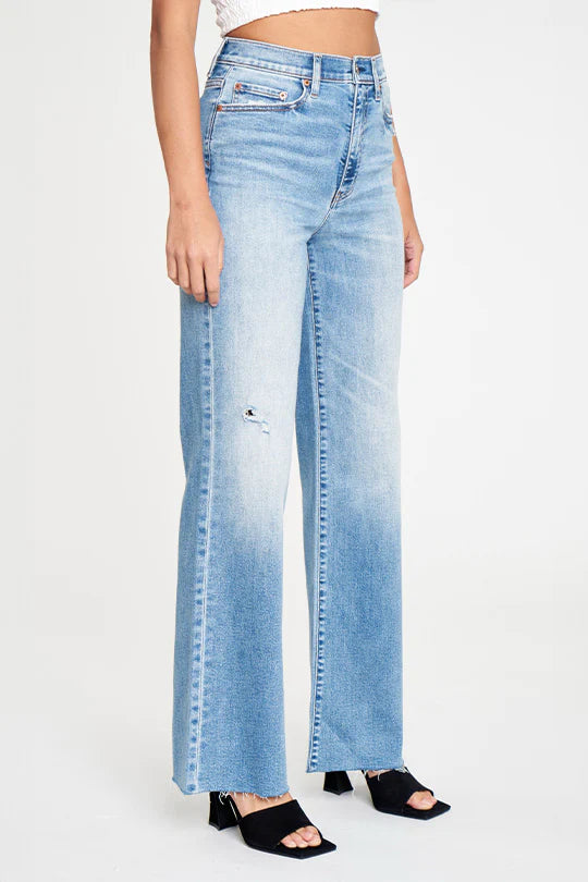 Daze Far Out Jean Dance Floor. The cool girl jean, Far Out is a baggy and modern silhouette with vintage character. In a waist defining high rise and a relaxed leg, constructed in denim that's mostly rigid, but with a touch of stretch.
