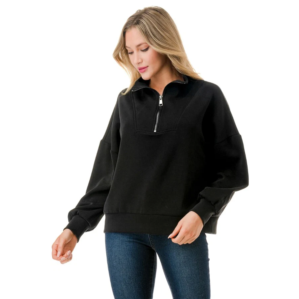 The Margaret Half Zip Sweater is the perfect combination of style and comfort. With a half zip design, it's easy to wear and ultra soft material will keep you cozy all day long. Upgrade your wardrobe with this must-have sweater! Matching pants also available.