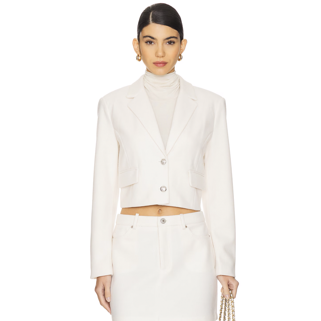 Unleash your bold, adventurous side with the Steve Madden Seraphine Blazer in Cream. This blazer is designed for those who embrace risk and stand out with confidence. Its sleek, cream hue makes it the ultimate statement piece, perfect for any occasion and ideal for fashion-forward individuals looking to make an impact.