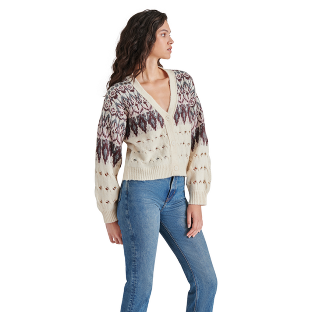 Stay stylish and cozy with this Steve Madden Irisa Cardigan, featuring a slightly cropped design and a trendy open-knit hem – the perfect layering piece for your wardrobe!