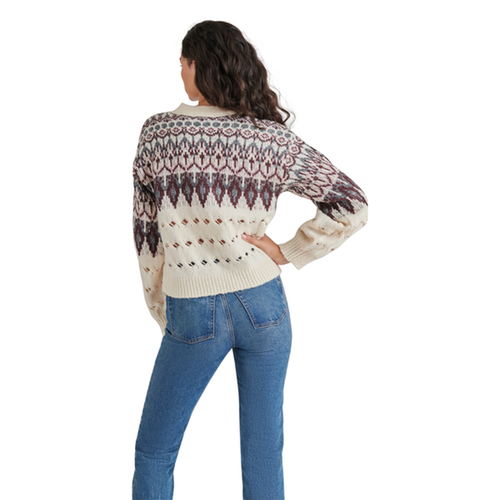 Stay stylish and cozy with this Steve Madden Irisa Cardigan, featuring a slightly cropped design and a trendy open-knit hem – the perfect layering piece for your wardrobe!