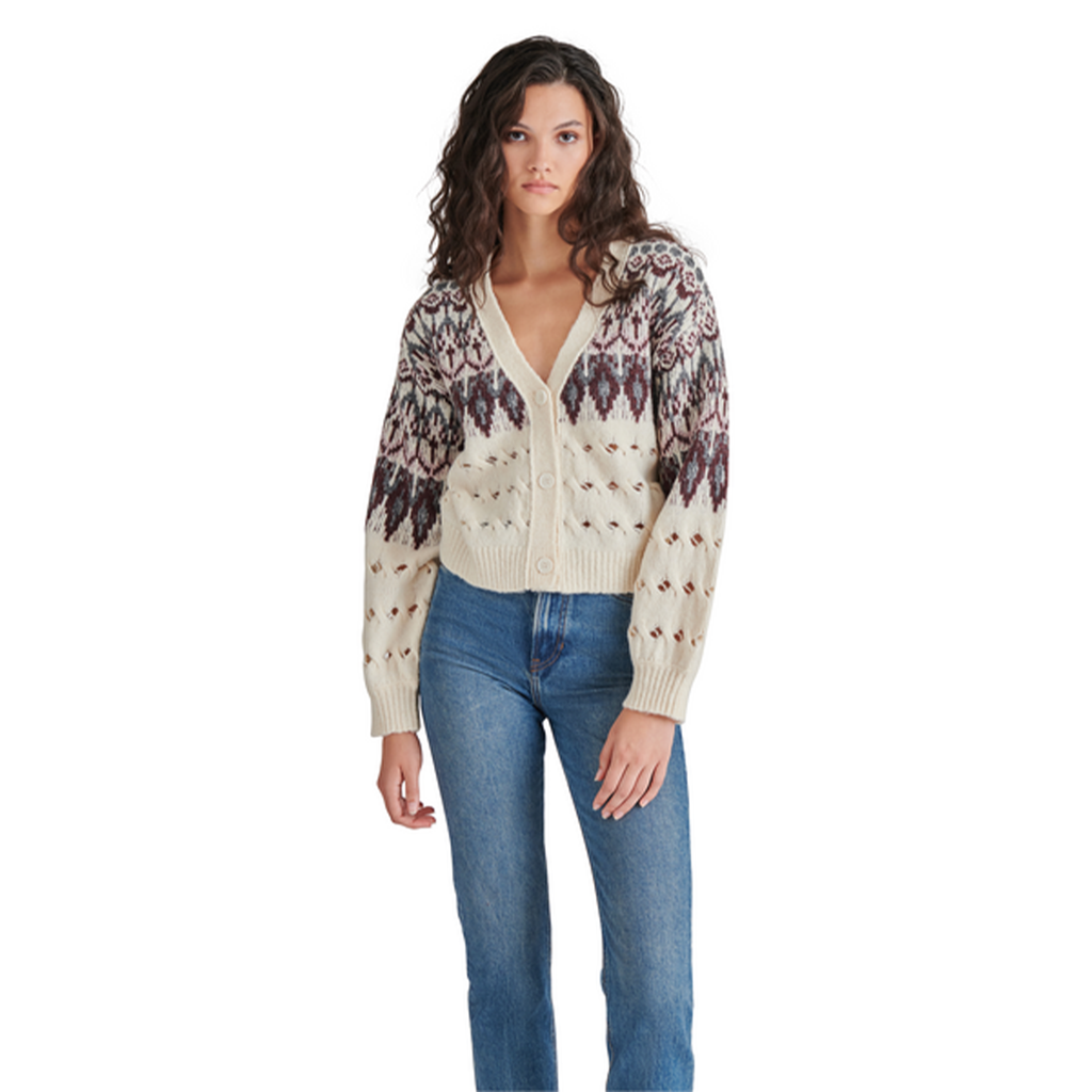 Stay stylish and cozy with this Steve Madden Irisa Cardigan, featuring a slightly cropped design and a trendy open-knit hem – the perfect layering piece for your wardrobe!