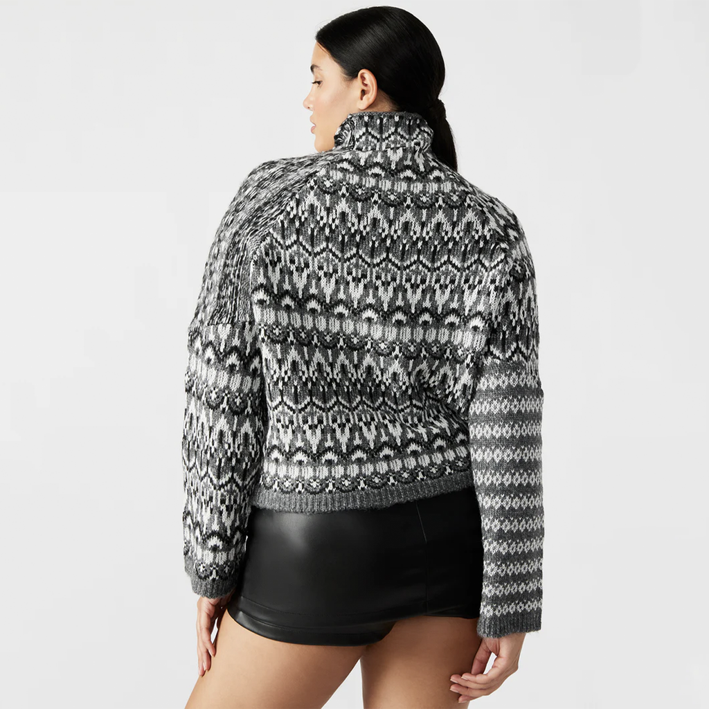 Stay cozy and stylish this fall with the Indie Sweater by Steve Madden! Featuring a mock neck and cropped design, this sweater offers a relaxed raglan straight fit with an allover pattern that’s both playful and comfortable for crisp autumn days. Slip it on and hit the streets in style this season!