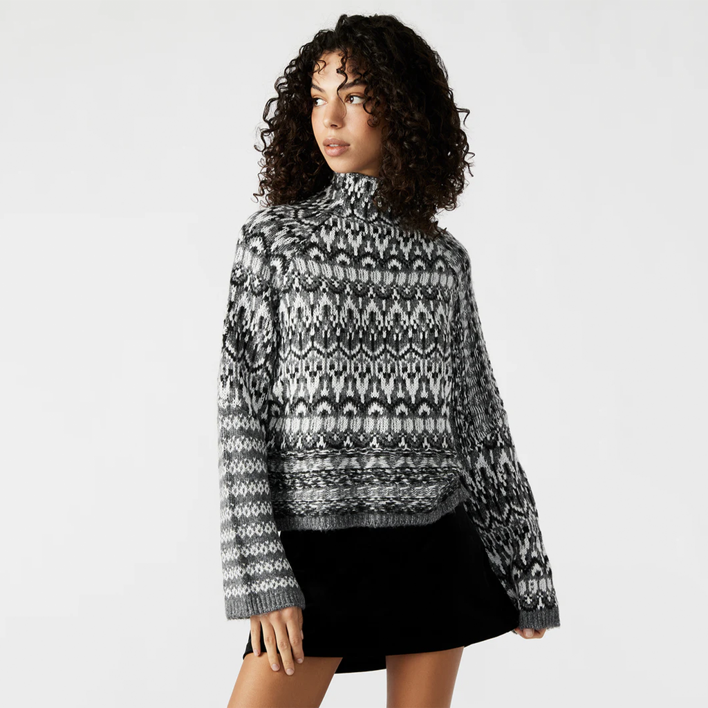 Stay cozy and stylish this fall with the Indie Sweater by Steve Madden! Featuring a mock neck and cropped design, this sweater offers a relaxed raglan straight fit with an allover pattern that’s both playful and comfortable for crisp autumn days. Slip it on and hit the streets in style this season!