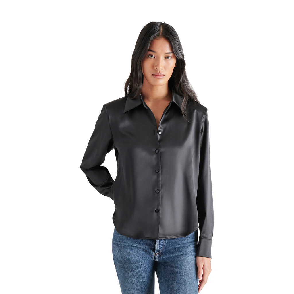 Meet the Steve Madden Asa Top – a sleek black satin blouse featuring a button-up front, a classic collared neckline, and elegant long sleeves. This versatile and stylish piece is perfect for elevating any outfit, whether you're dressing it up or keeping it casual.