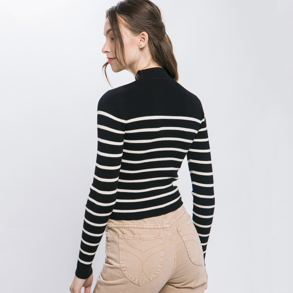 Elevate your wardrobe with this striped long-sleeve knit shirt, crafted from a soft, ribbed knit fabric. The mock neck and sleek striping detail add a stylish touch to this versatile piece. Pair it with jeans or trousers for an easy yet fashionable look.