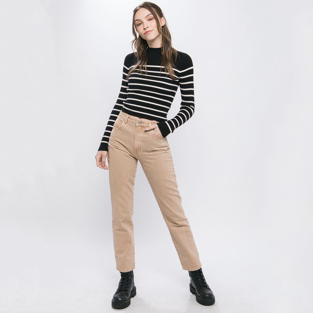 Elevate your wardrobe with this striped long-sleeve knit shirt, crafted from a soft, ribbed knit fabric. The mock neck and sleek striping detail add a stylish touch to this versatile piece. Pair it with jeans or trousers for an easy yet fashionable look.