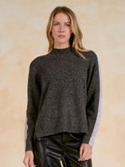 Front view of a colorblock crewneck sweater.