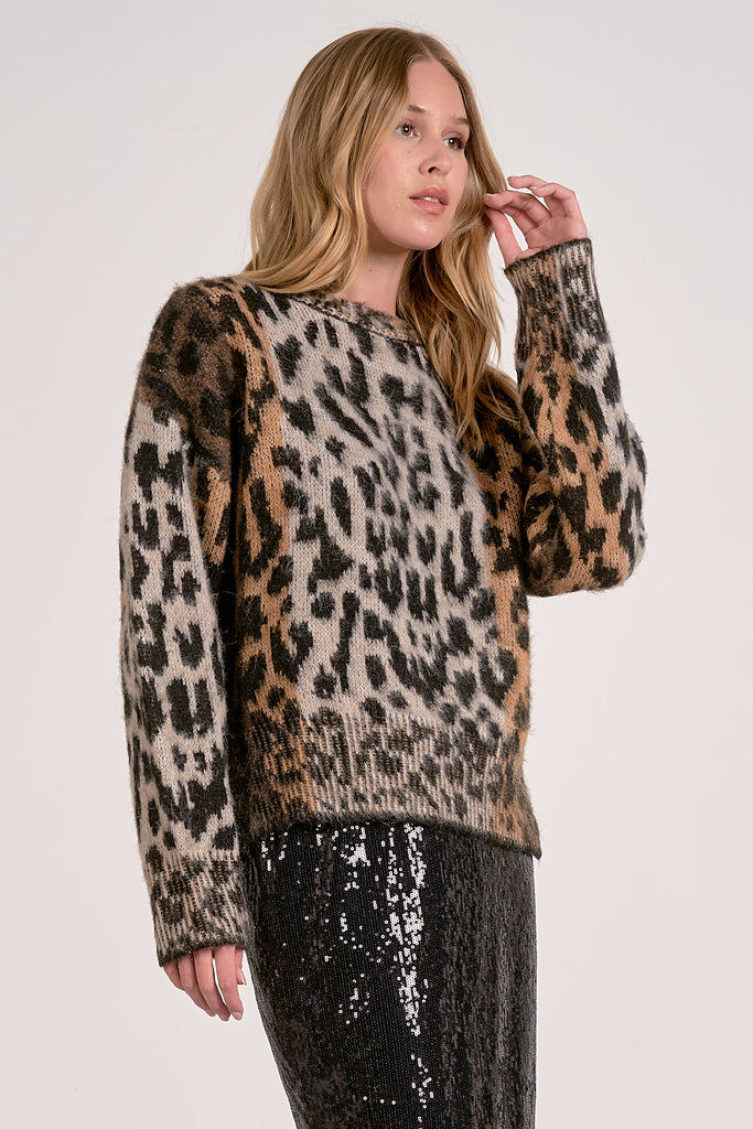 leopard print sweater, fuzzy knit pullover, animal print top, cozy winter sweater, soft knit top, trendy fall sweater, women’s leopard crewneck